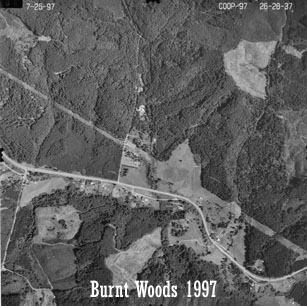 Aerial view of Starker Forests land near Burnt Woods, 1997